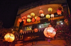 Lit lanterns in one of the shophouses